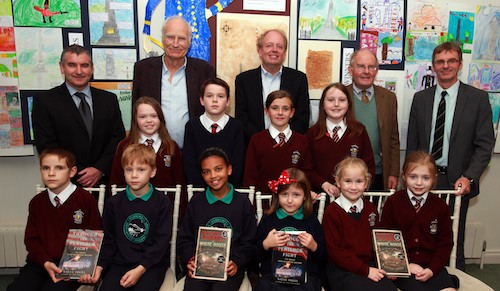 Local school children who took part in the Rostrevor Community Association General Ross art and literature competition are pictured at An Cuan, Rostrevor at an exhibition of their work. Back row St Bronagh’s Principal John Gallagher, key speakers Steve Vogel and Peter Snow, Francis de Courcy Hamilton and Gerard McGivern, NMDC Director of District Development. Local school children who took part in the Rostrevor Community Association General Ross art and literature competition are pictured at An Cuan, Rostrevor at an exhibition of their work. Back row St Bronagh’s Principal John Gallagher, key speakers Steve Vogel and Peter Snow, Francis de Courcy Hamilton and Gerard McGivern, NMDC Director of District Development.